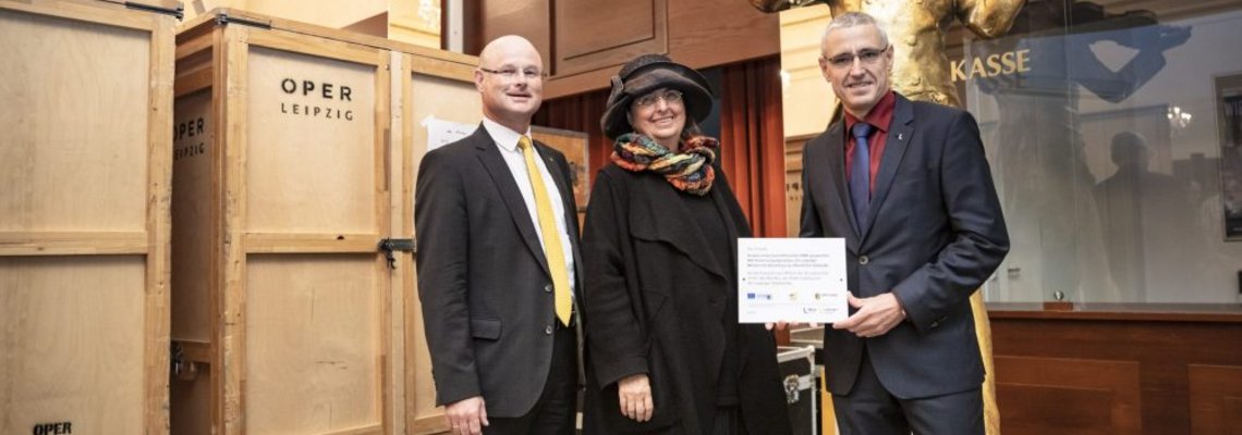  Christian Weßling, Dorothee Dubrau und Andreas Kühnl stehen nebeneinander und lächeln in die Kamera.