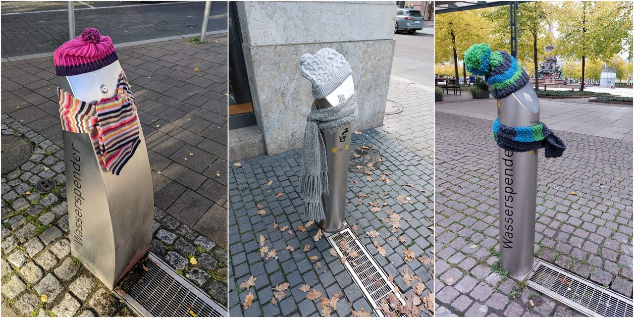 Trinkbrunnen mit Schal und Mütze